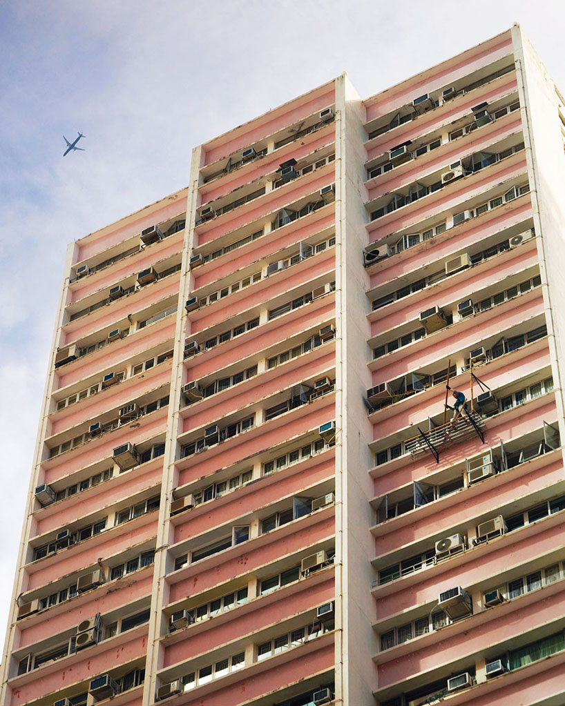 romain jacquet-lagrèze captures bamboo scaffolding workers hovering above hong kong