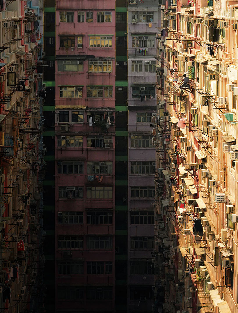 romain jacquet-lagrèze captures bamboo scaffolding workers hovering above hong kong