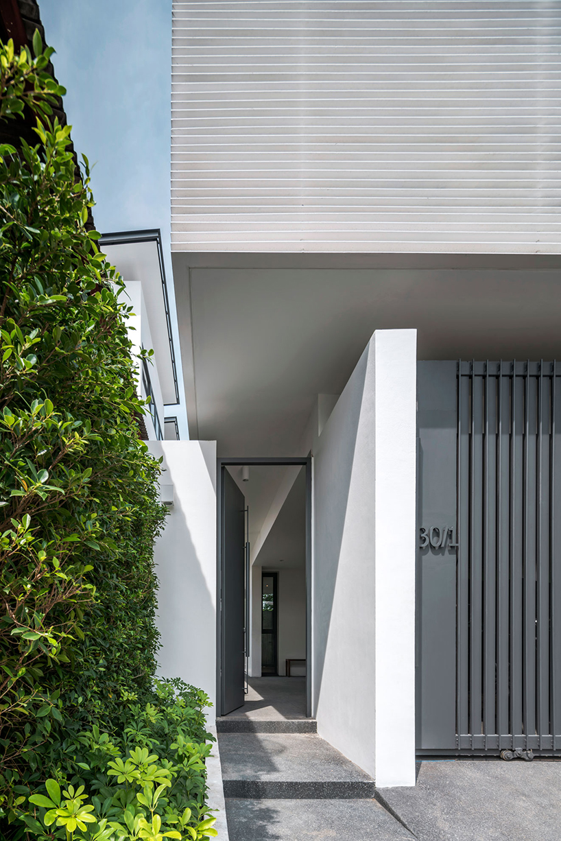 anonym's Y house is designed to be protective as well as open towards the urban changes