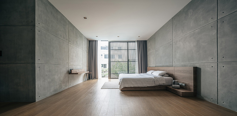 anonym studio combines wood, concrete and metal in a family residence in bangkok