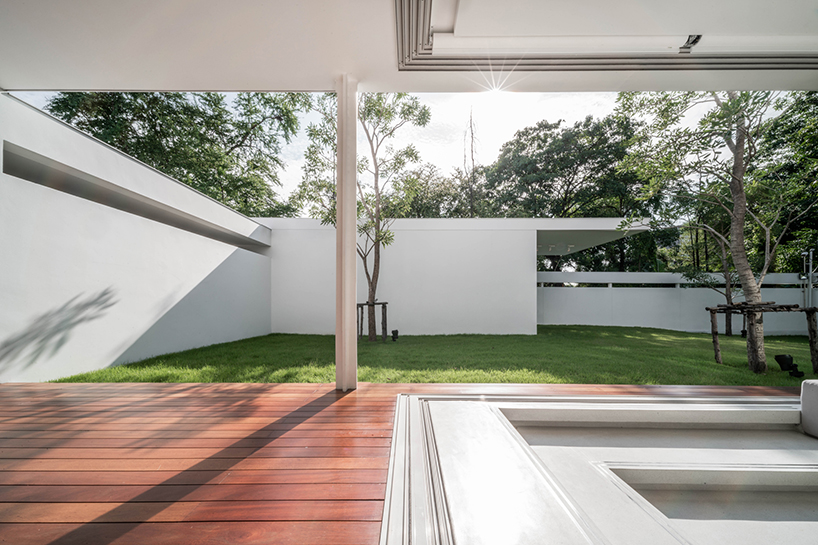 anonym studio extends a family home with a light-filled pavilion in bangkok