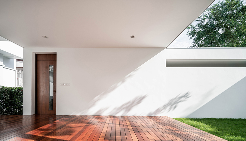 anonym studio extends a family home with a light-filled pavilion in bangkok