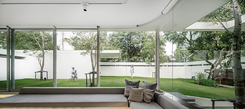 anonym studio extends a family home with a light-filled pavilion in bangkok