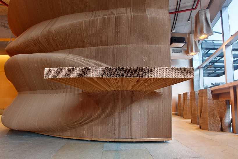 this mumbai cafe by NUDES is made almost entirely from cardboard designboom