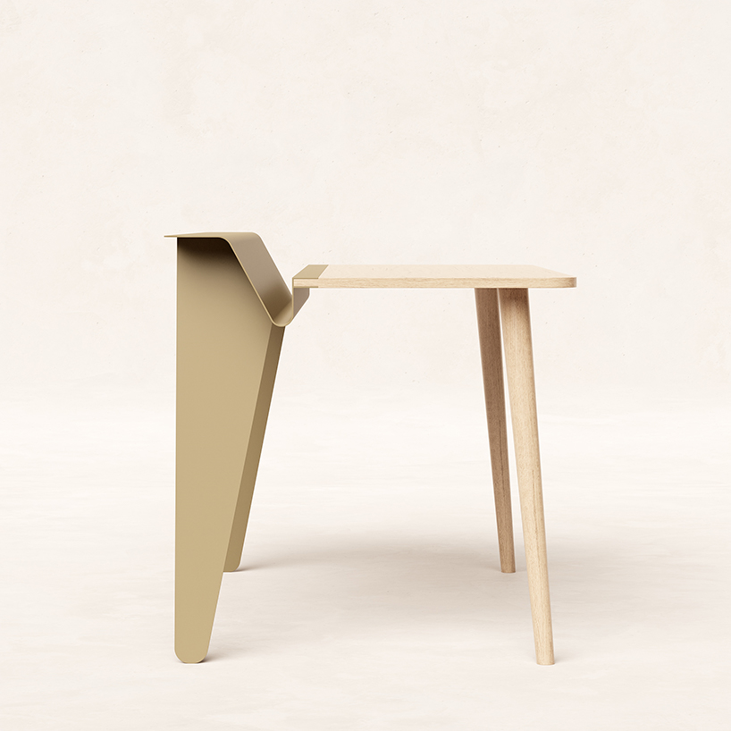 the piano desk features a metal stand that holds books like sheets of music designboom