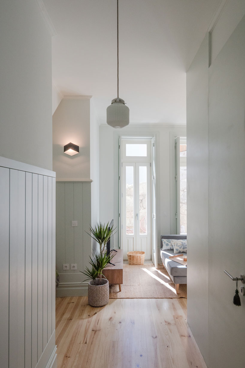pedro ferreira refurbishes art deco house into tourist-use unit in porto