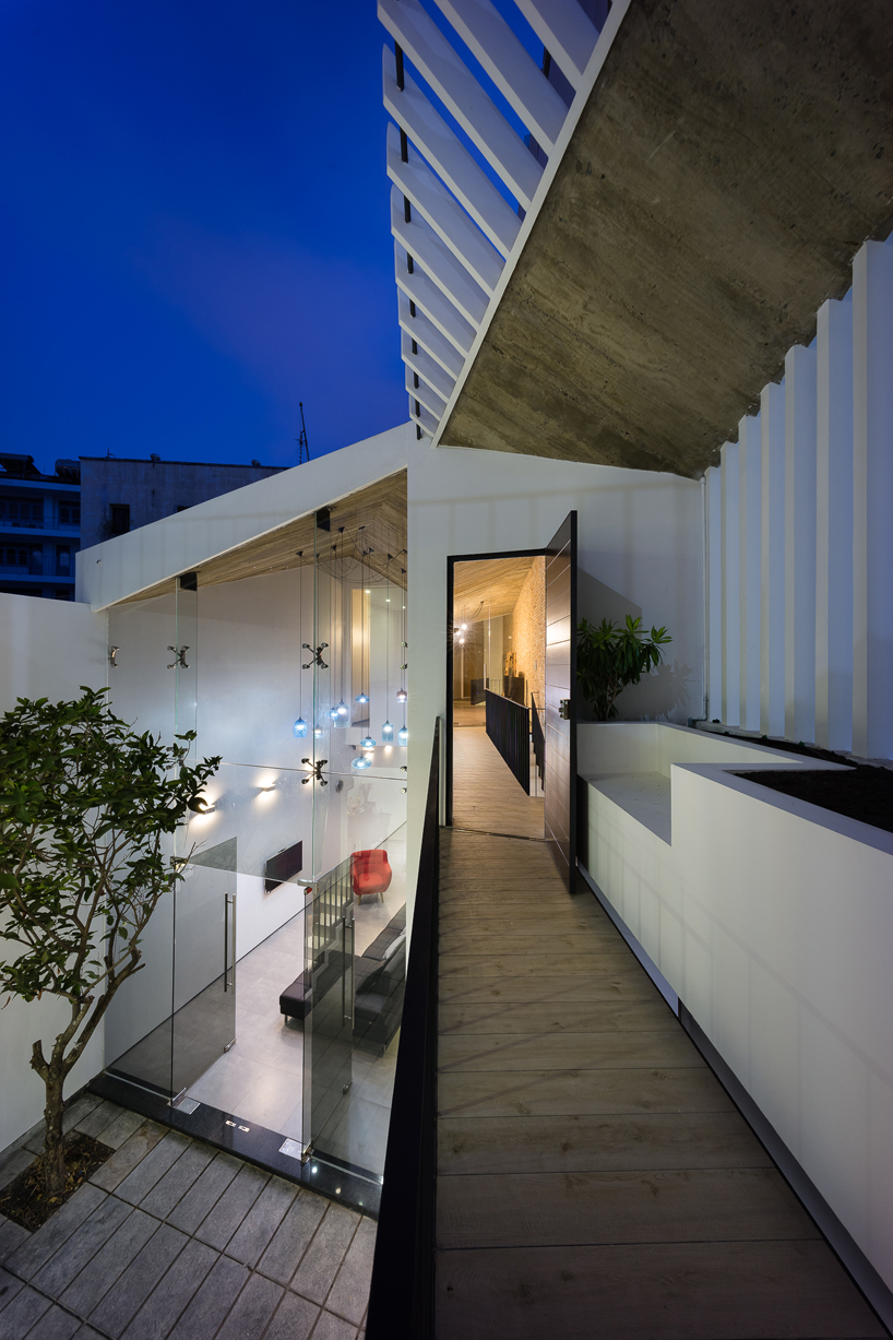 adplus studio 3 houses folded roof ho chi minh city designboom