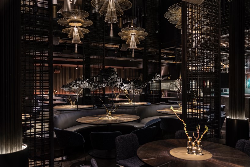 4.5-meter-tall glass-hewn buddha sculpture decorates restaurant interior by YOD group in new york
