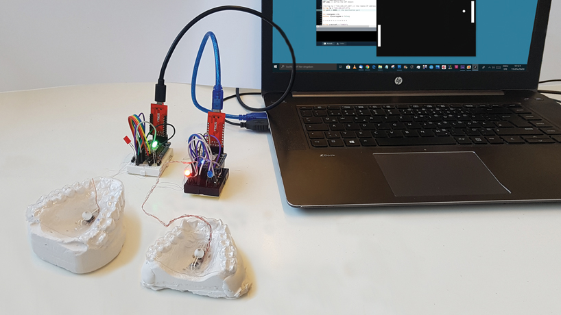 [in]brace is a wearable device that uses tongue movement to interact with computers designboom