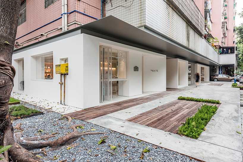 lukstudio creates a café and coworking space in a body of white boxes - 1
