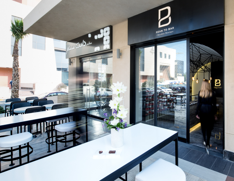 studio toggle encloses chocolate boutique within a cellular steel vault