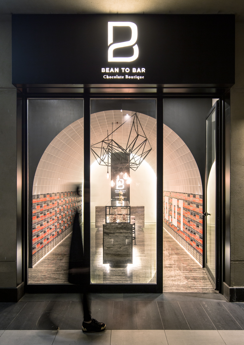 studio toggle encloses chocolate boutique within a cellular steel vault