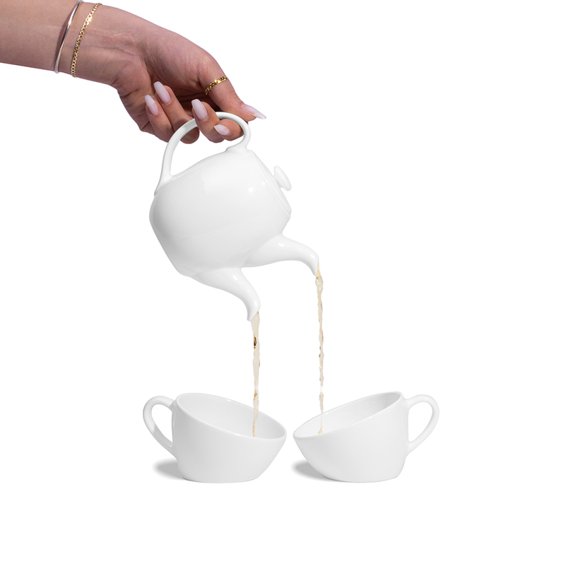 a surreal handbag and tea set designed to make you question your reality 7