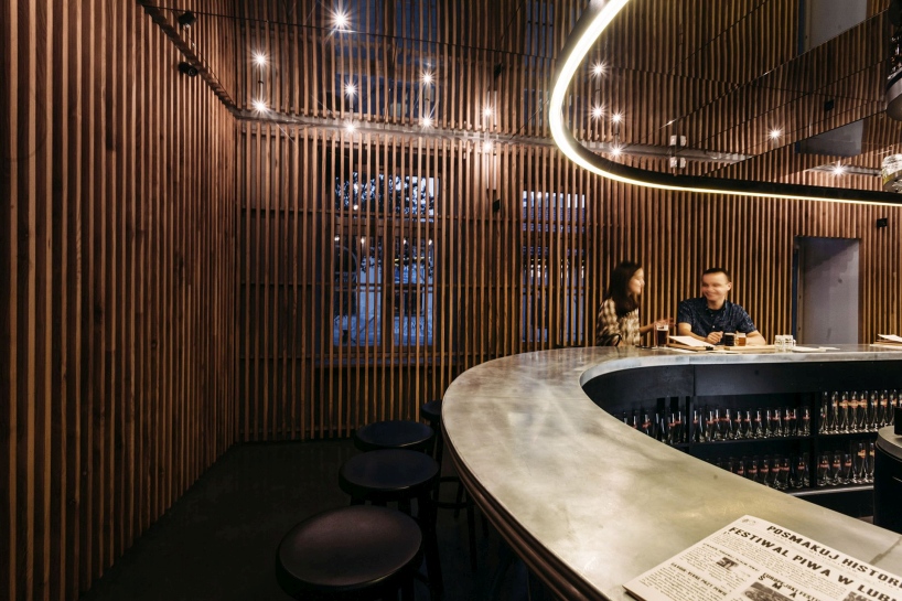 a 30-meter bar dominates projekt praga's perłowa beerhouse in lublin