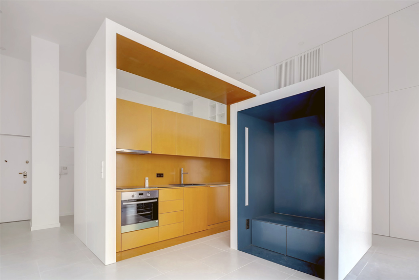 waataa converts commercial studio into colorful space-saving rooms - 1