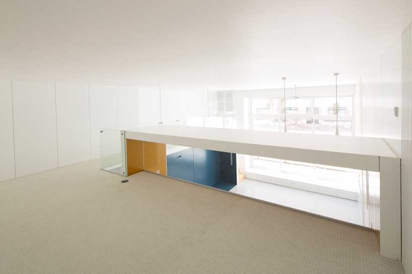 waataa converts commercial studio into colorful space-saving rooms