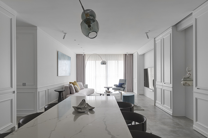 marty chou architecture creates elegant interior for 'the mermaid's' apartment in taiwan