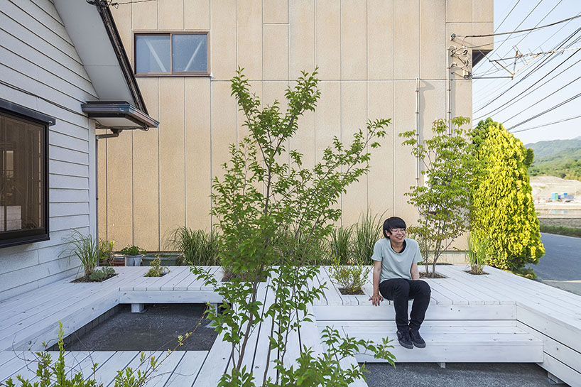 this barbershop terrace in suburban japan helps to build local community