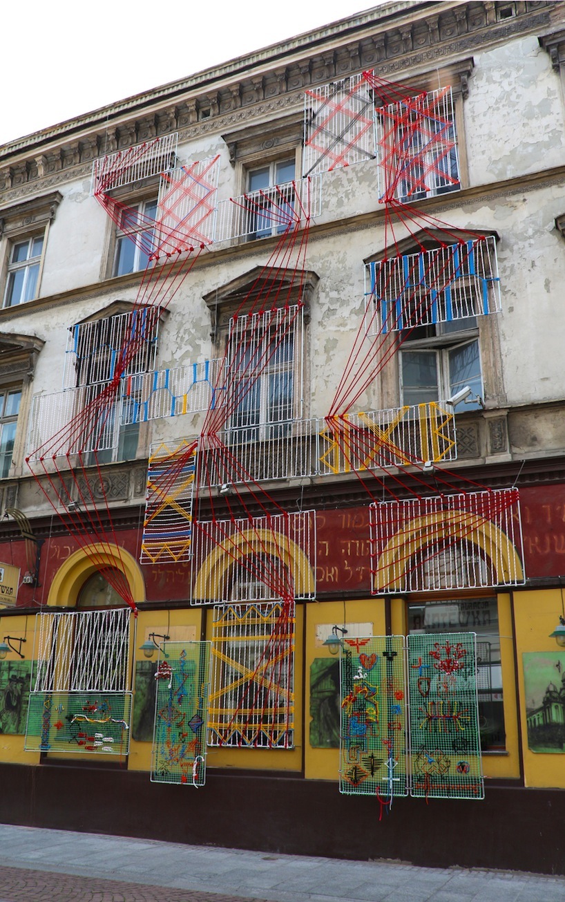 entropika intertwines past and present with woven façade in łódź, poland