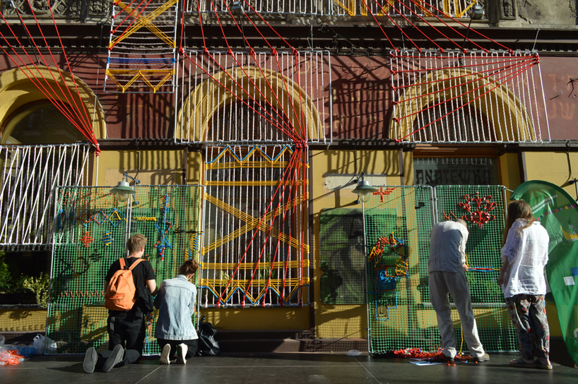 entropika intertwines past and present with woven façade in łódź, poland