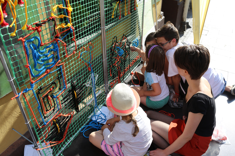 entropika intertwines past and present with woven façade in łódź, poland
