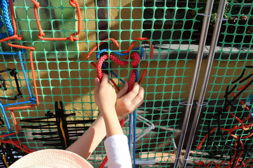 entropika intertwines past and present with woven façade in łódź, poland