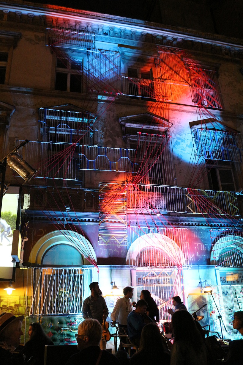 entropika intertwines past and present with woven façade in łódź, poland