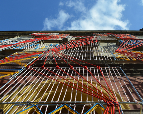 entropika intertwines past and present with woven façade in łódź, poland