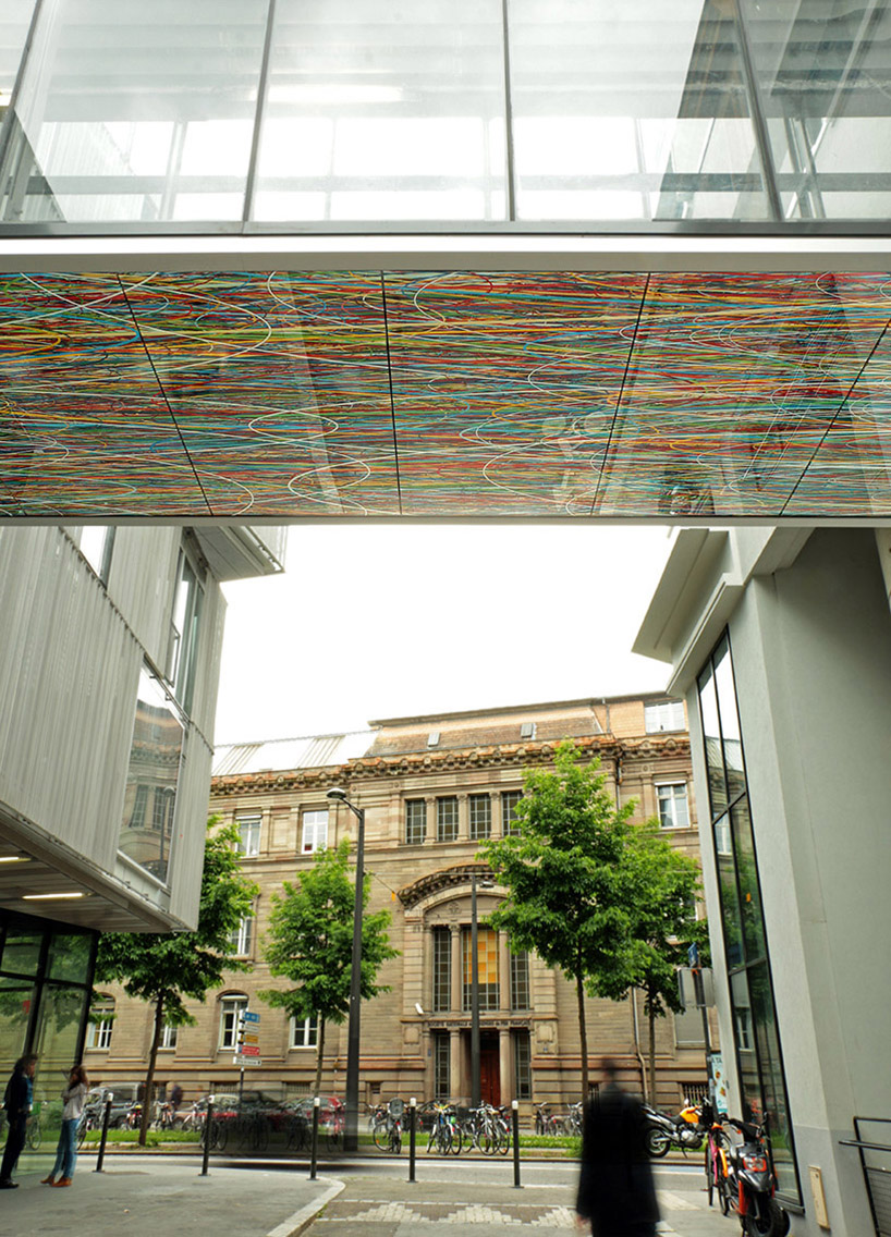 pascal dombis prints line-curved shapes on glass bridge underside in france