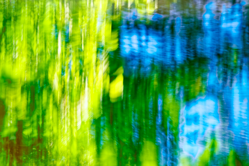 coral-toned timber and mirror canopy by GRRIZ transforms footbridge above river in france