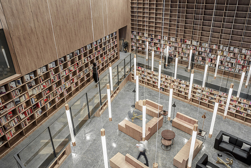 van wang architects converts an obsolete sales pavilion in china into a community library - 1