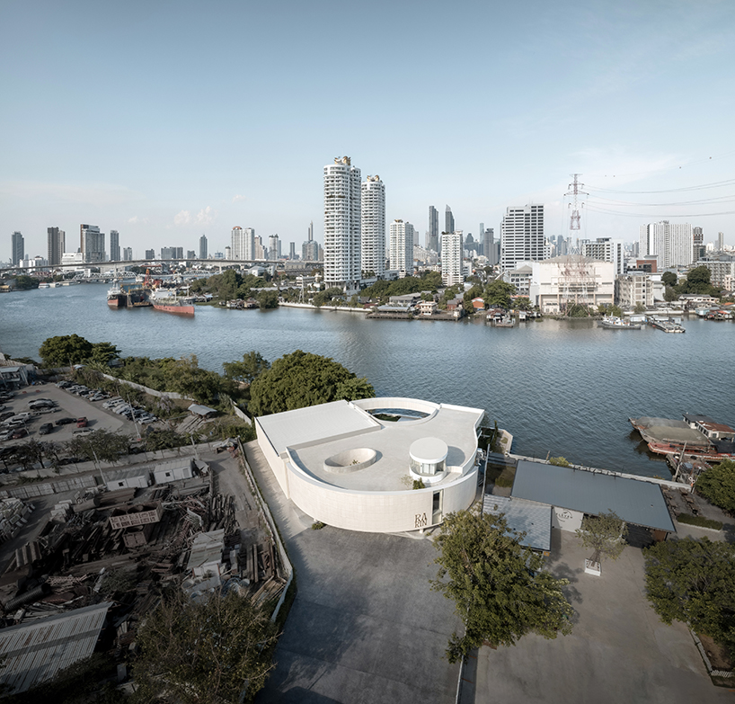 ASWA's riverside wedding venue shapes continuous curves into ring formation in bangkok