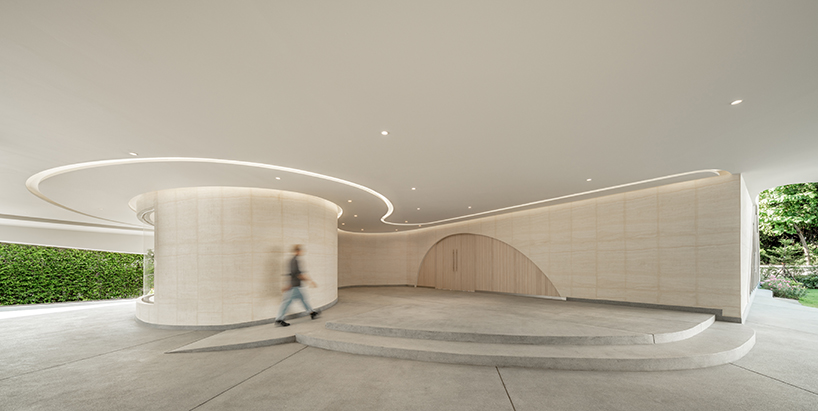 ASWA's riverside wedding venue shapes continuous curves into ring formation in bangkok