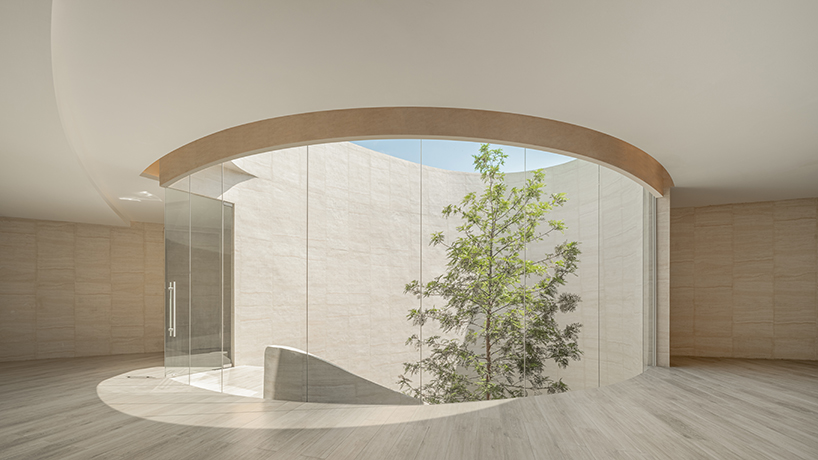 ASWA's riverside wedding venue shapes continuous curves into ring formation in bangkok