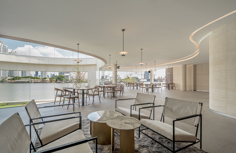 ASWA's riverside wedding venue shapes continuous curves into ring formation in bangkok