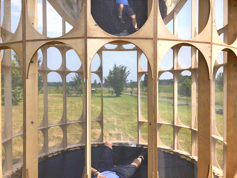 atelier ari builds inverted watch tower in france with a trampoline and ...