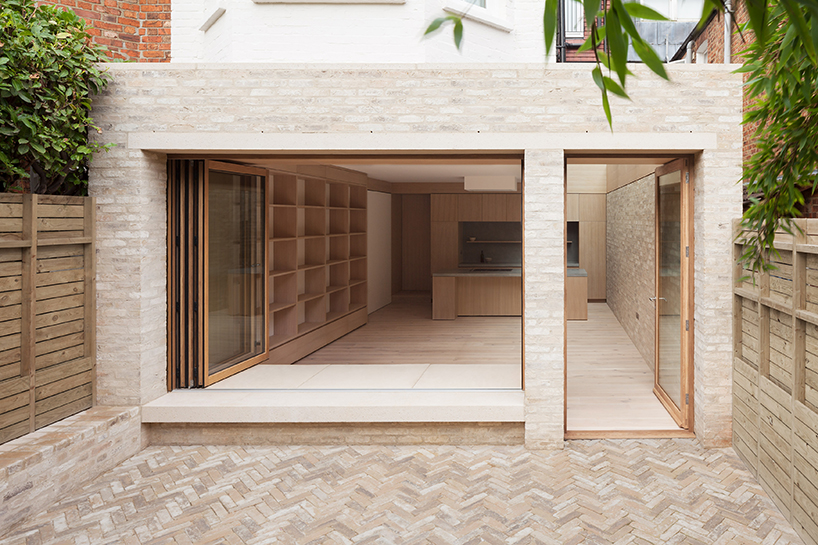 erbar mattes wraps london home in soft wood and dusty brick