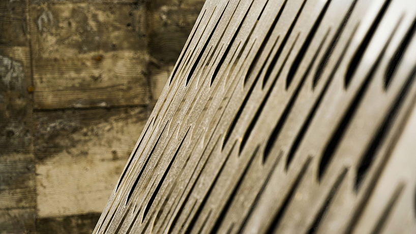 west-line studio's triangular-shaped cultural center in china pays homage to shui people