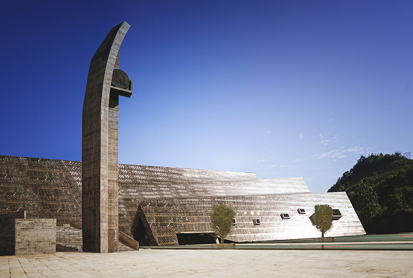 west-line studio's triangular-shaped cultural center in china pays homage to shui people