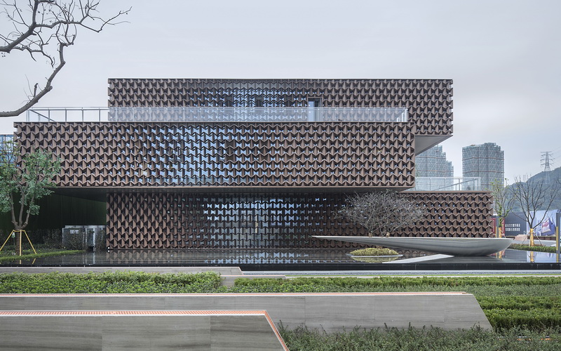 NAN architects covers a sales center with a geometrical pattern designboom