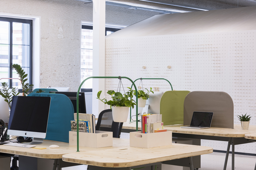 studio banana fill mccann worldgroup's madrid office with multi-functional 'huts'