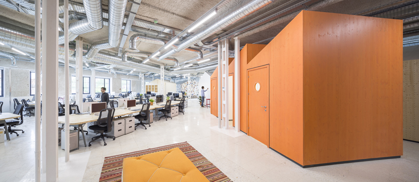 studio banana fill mccann worldgroup's madrid office with multi-functional 'huts'