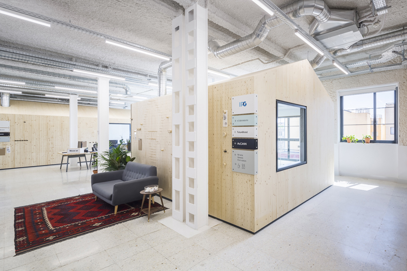 studio banana fill mccann worldgroup's madrid office with multi-functional 'huts'