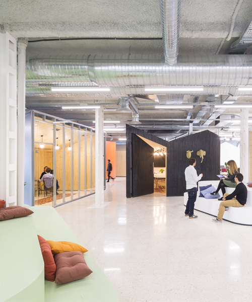 studio banana fill mccann worldgroup's madrid office with multi-functional 'huts'