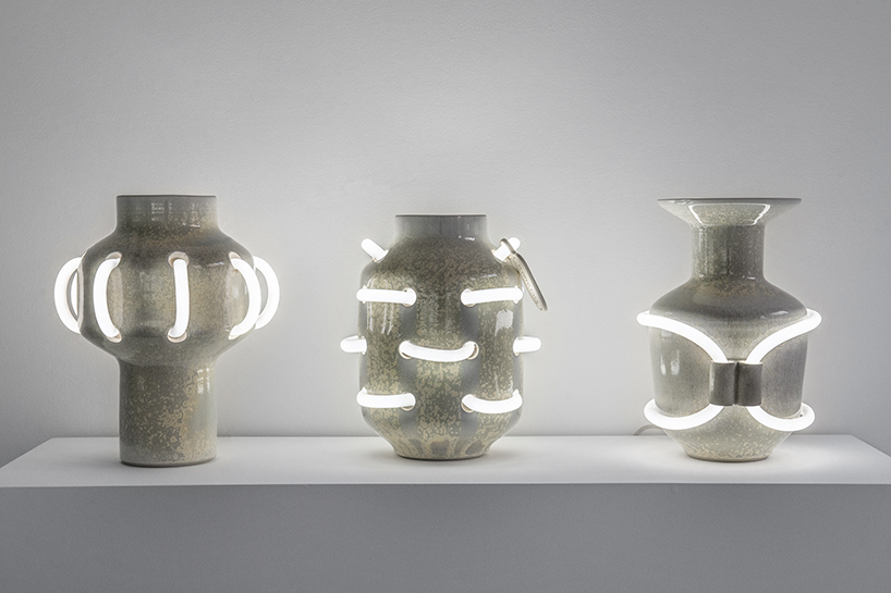 néophore series by döppel studio embeds neon lights into ceramic amphorae