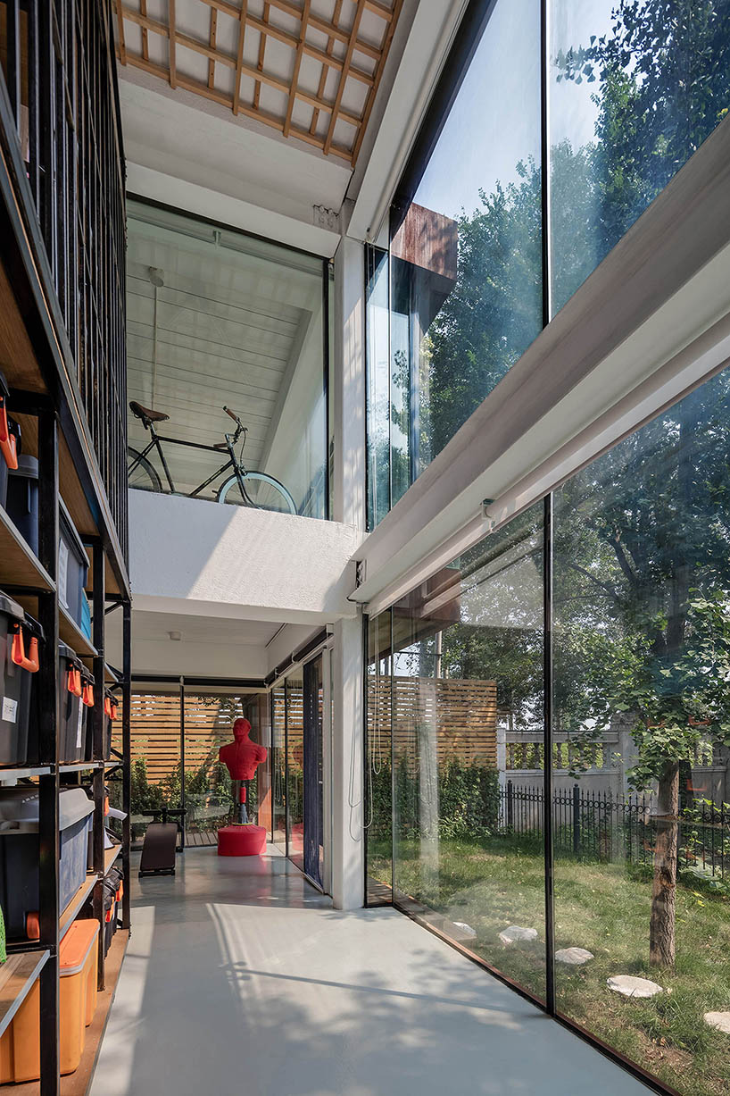 glass + steel additions define beijing film studio by cun-design