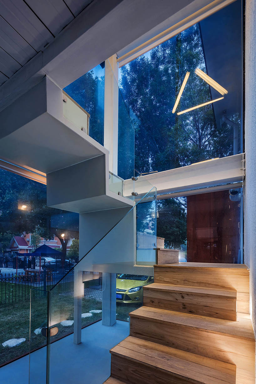 glass + steel additions define beijing film studio by cun-design