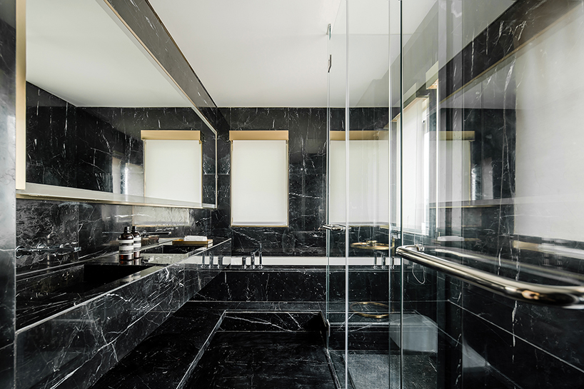 co-direction uses marble and bronze stainless steel to create exquisite interior in china