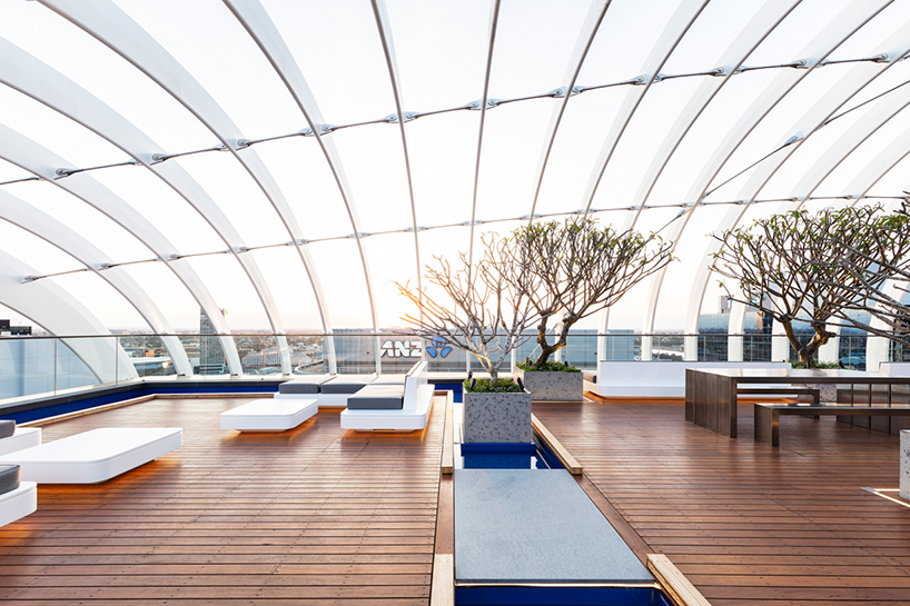 koichi takada architects uses over 300,000 bricks to create 'arc' façade in sydney