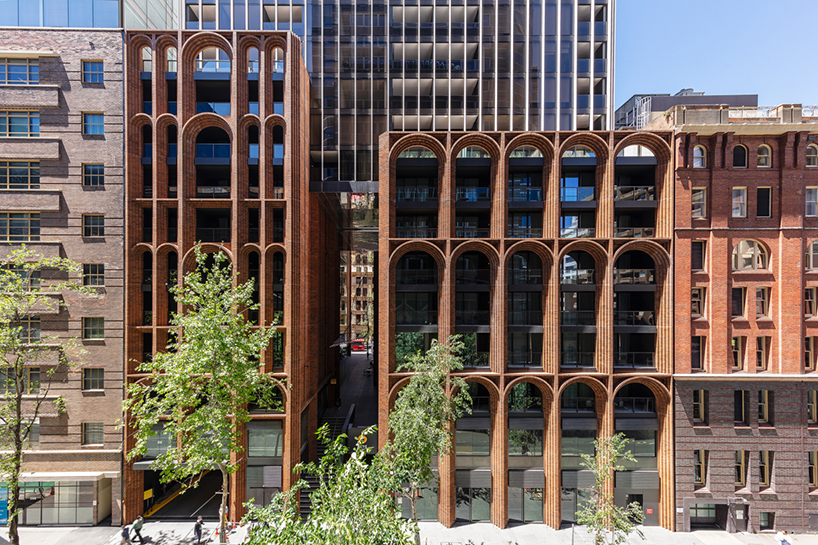 koichi takada architects uses over 300,000 bricks to create 'arc' façade in sydney
